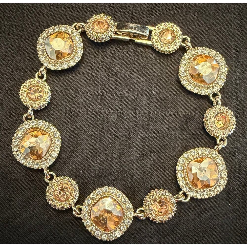 NWOT 14k gold over Stainless Steel 6.75” bracelet champagne colored crystals